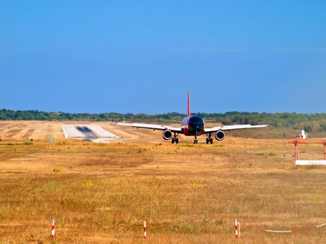 airplane on runway - front view 