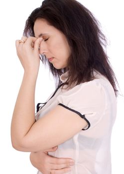 A woman having a headache, closeup isolated
