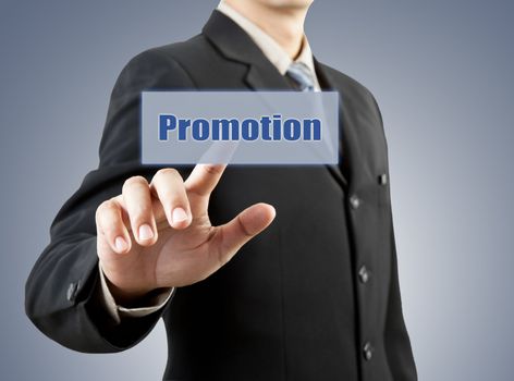 businessman hand pushing promotion button