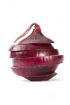 Red  sliced onion on white background