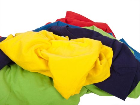 pile of crumpled colorful t shirts