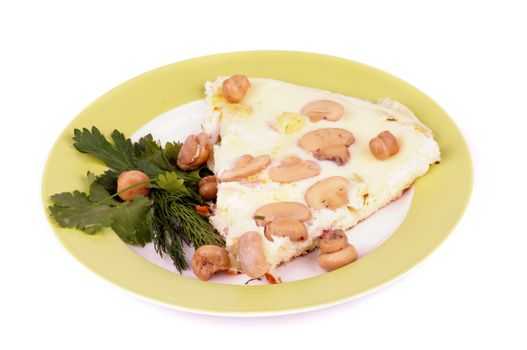 Delicate French Omelet with Little Champignons, Dill and Parsley on Green Plate isolated on white background