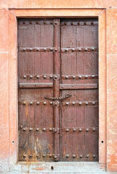 Old brown wooden door. Rajasthan,India