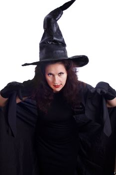 pretty young brunette witch, isolated against white background