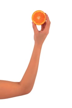 Woman's hands with orange isolated over white background