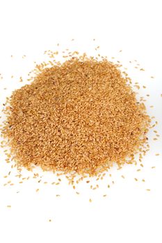 Image of linseed on white background. Image of yellow food grains on white background.