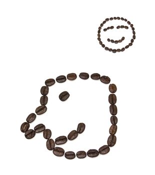 Smile shaped coffee beans isolated on white background.The concept is that A good cup of coffee.