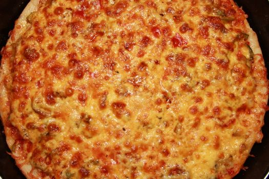 Appetizing pizza with a thick layer of cheese. pie