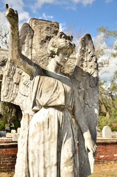 Statue of an angel in historic Oak Grove Cemetery in St. Marys, Georgia