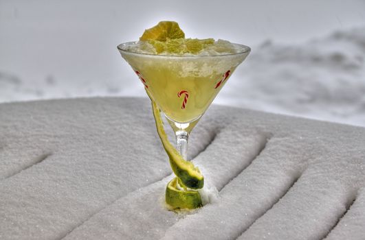 Decorated frozen marguerita drink on a bed of snow