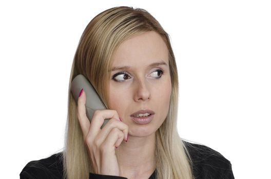 portrait of a young woman talking on the phone on white background