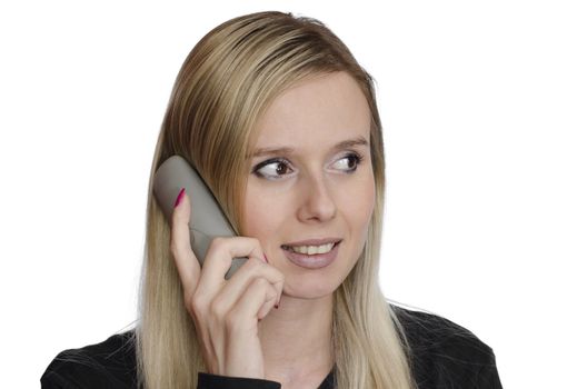 young woman talking on the phone smiling on white background