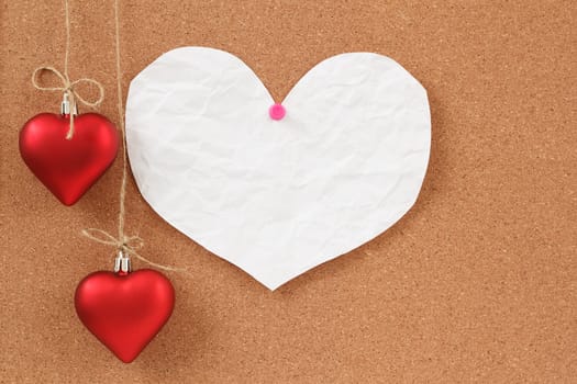 empty note for valentine message on red background