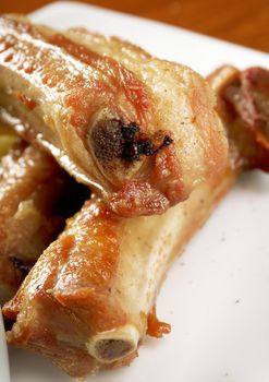 barbecued pork ribs and vegetables.Shallow depth-of-field. 