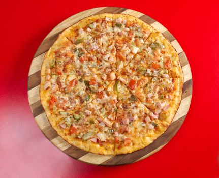 Pizza roasted ham . italian kitchen. Studio