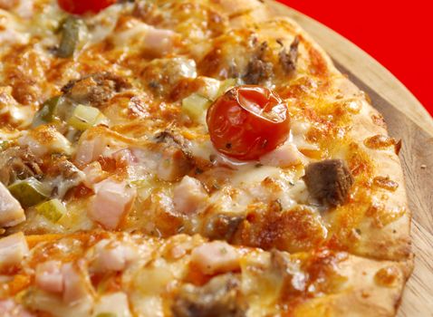 Pizza east with tomato. italian kitchen. Studio