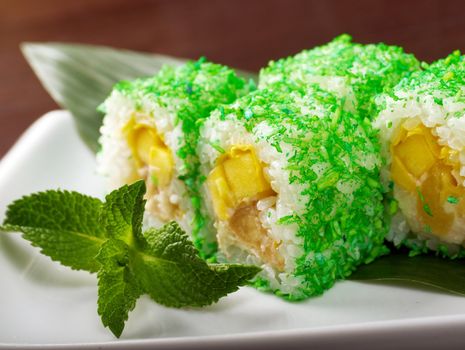 Japanese sushi  traditional japanese food.Roll made of Smoked fish and green roe