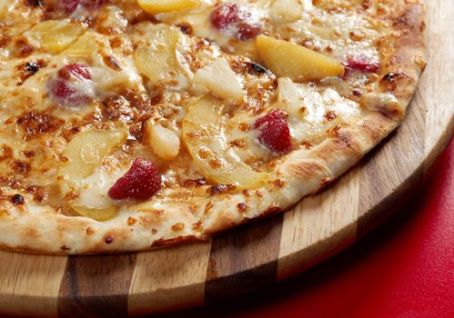 Pizzasweet with strawberries. italian kitchen. Studio