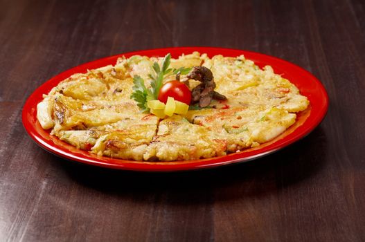 Japanese food close-up Okonomiyaki.(Japanese pizza)