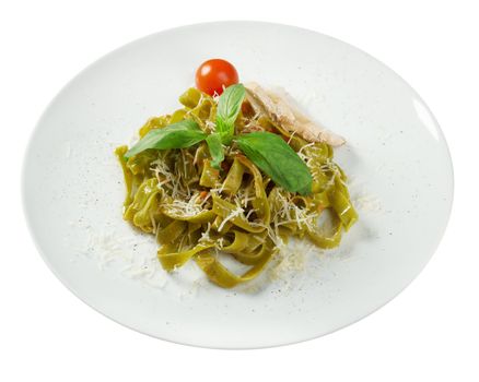 Pasta tagliatelle with pesto sauce basil and grated parmesan