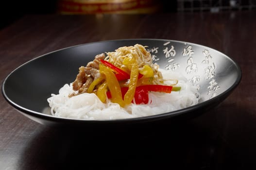 Chinese rice noodles with pork