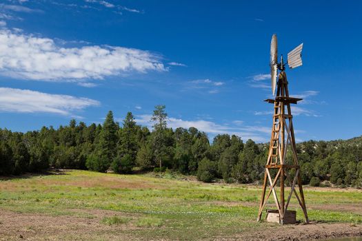 Old fashioned country windmill for pumping water