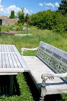 Wooden Bench in a Garden