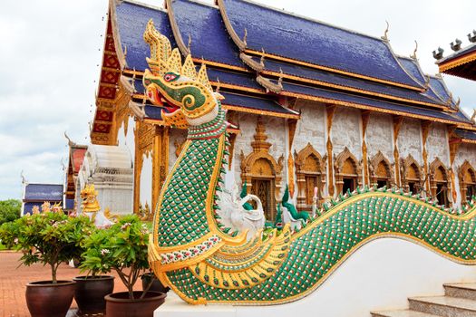 naga in front of buddhist temple in thailand