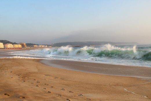 Evening on the beach and big ocean waves