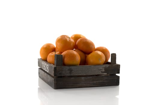 old wooden box with tangarine fruit