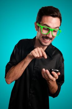 funny man holding phone on blue background