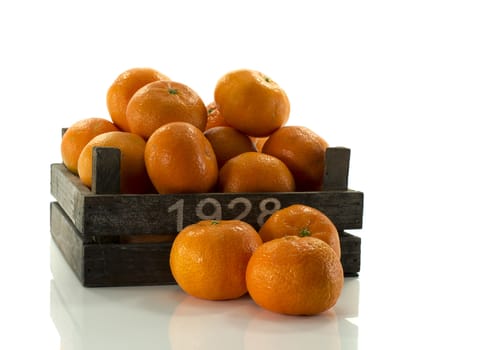old wooden box with tangarine fruit