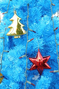 close-up of christmas ornaments on tree