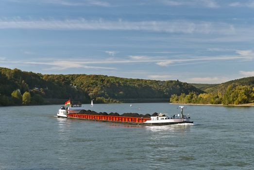 Cargo ship transporting coal. River Rhein, Germany