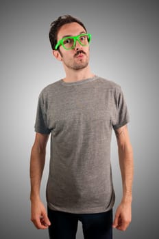 guy with green eyeglasses and mustache on green background