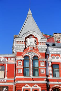 Town landscape with historic theater and blue sky