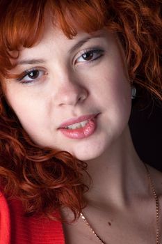Closeup portrait of beautiful redhead woman
