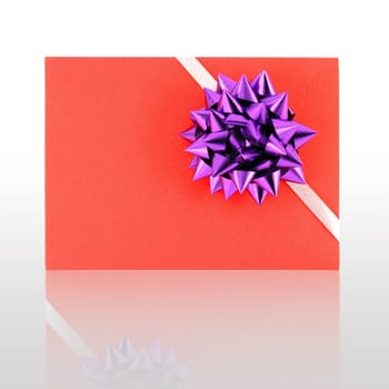 gift card with violet ribbin bow and shadow