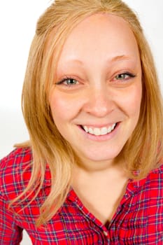 An attractive girl is photographed in the studio with a white background for this portrait.