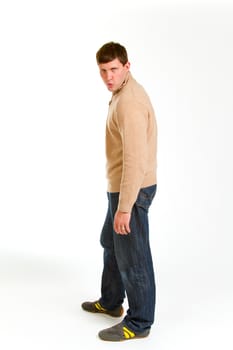 An attractive man is photographed against a white background in the studio for this portrait.