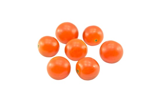 Seven tomatoes isolated on white background