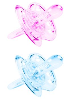 Blue and pink pacifier. Isolated on white background