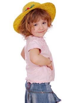 Little girl with hat posing studio shot