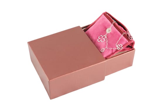 A gift box with a necklace in it