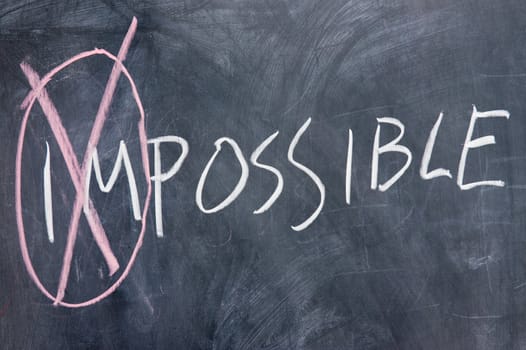 Chalkboard writing - concept of impossible or possible