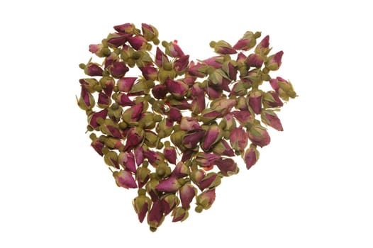 Heart shape made of dried flowers isolated on white background