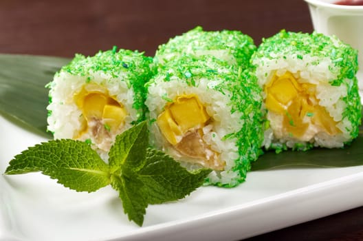 Japanese sushi  traditional japanese food.Roll made of Smoked fish and green roe