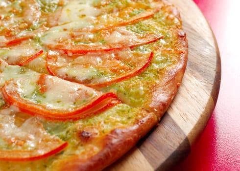 Pizza with tomato and cheese . italian kitchen. Studio