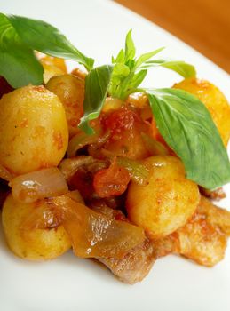 roast of veal with potatoes.closeup