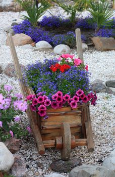 Decorative stand for flowers (type of truck) in landscape recreation area